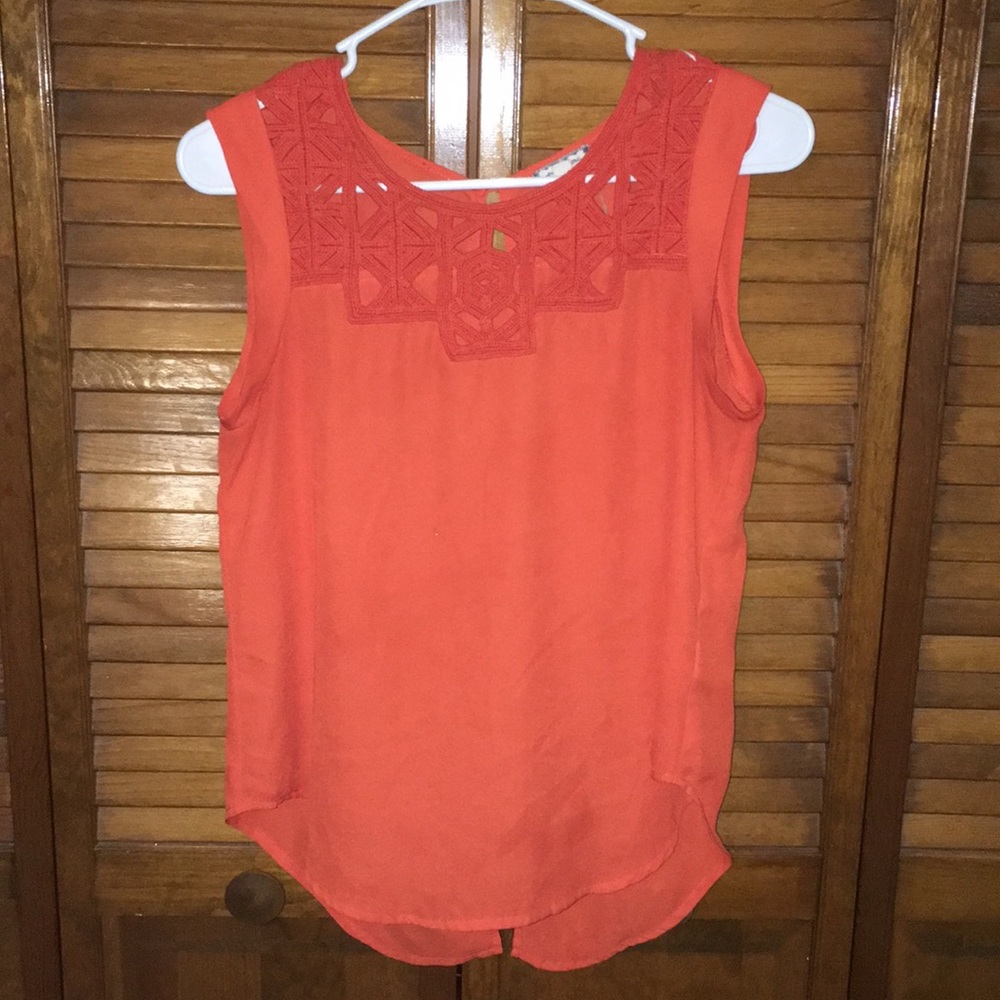 Red-orange blouse. Size extra small